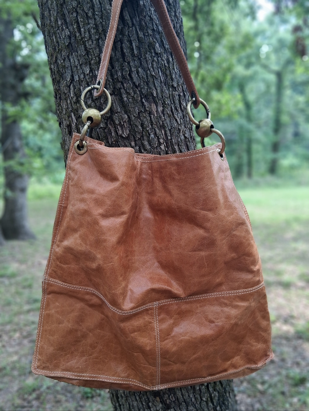 Nino BOSSI Cognac Brown Leather Shoulder Bag with Brass Ring Accents